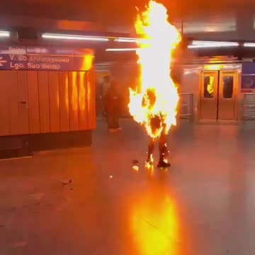 A man set himself on fire in a subway while surrounded by people in São Paulo Brazil.