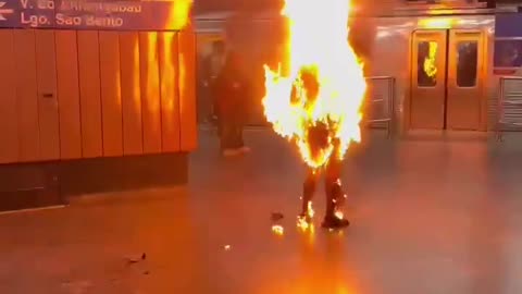 A man set himself on fire in a subway while surrounded by people in São Paulo Brazil.