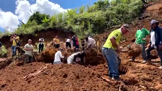 Colombians dig through landslide debris for survivors
