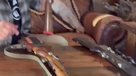 Why does Tim like having the sling swivel stud mounted on the barrel?