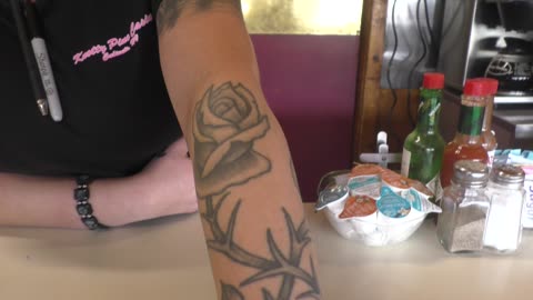 Knotty pine employee has awesome tatoos!
