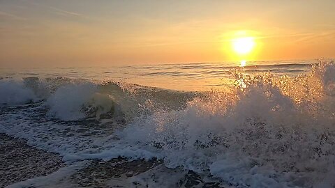 Waves at sunrise over Space Coast, Florida