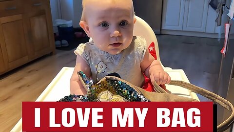 You Won't Believe This Baby's Reaction to a Shiny Purse!