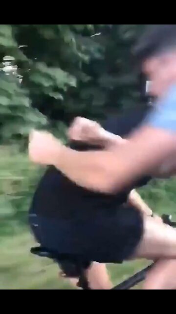 Man from car throws bicyclist off the road into woods