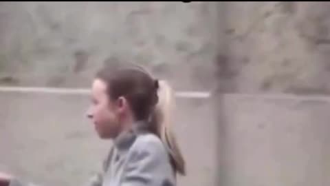 Epistine seen leaving with young girl