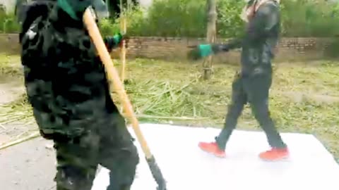 Clearing grass and weeds that block the yard, using modern tools