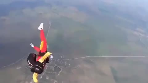 🚨 Instructor saves skydiver MID AIR that could not get her chute to open.