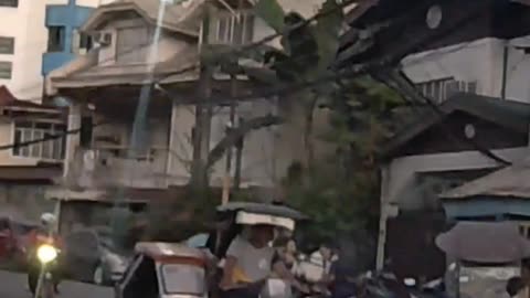 Joyful Afternoon on Malaya Street in Mandaluyong City in the Philippines