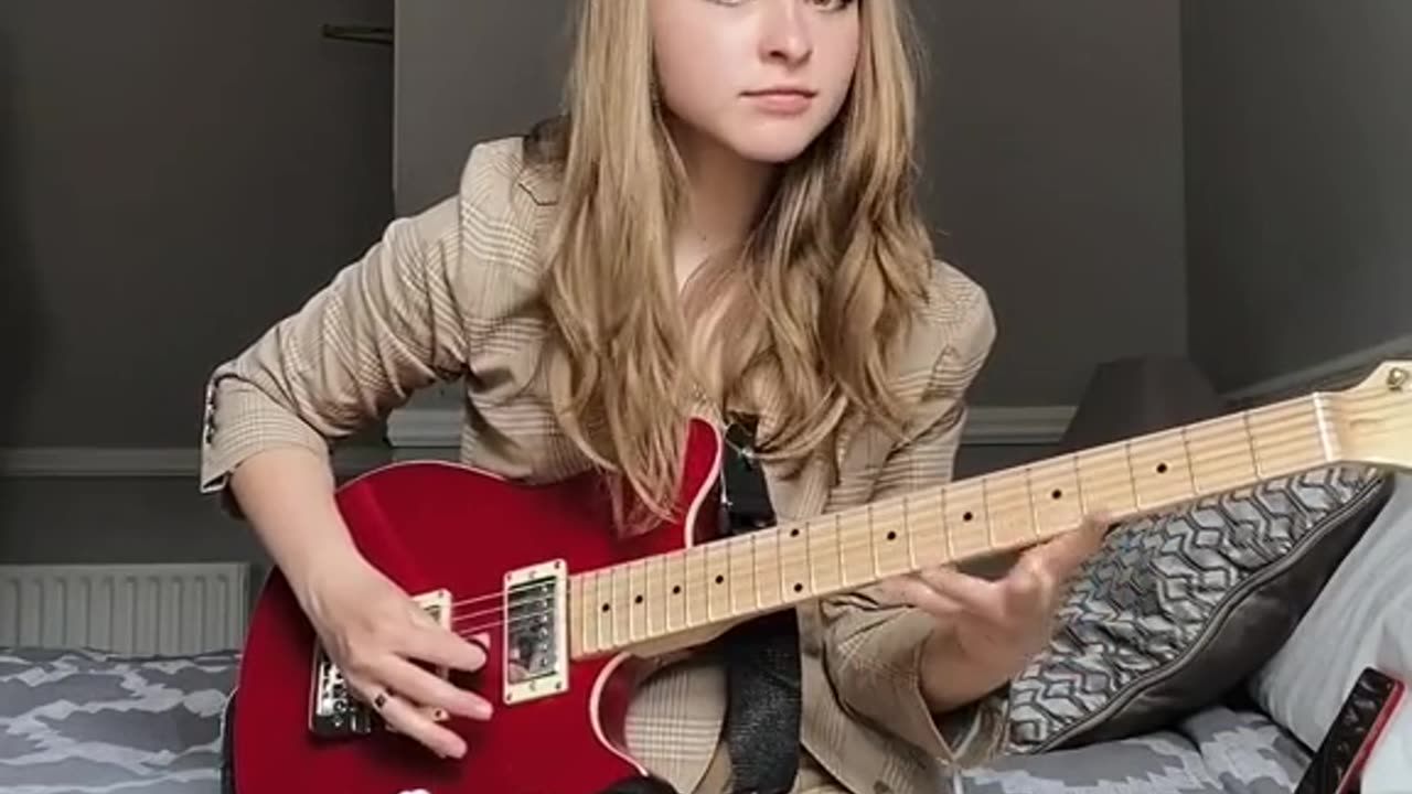gorgeous girl playing guitar