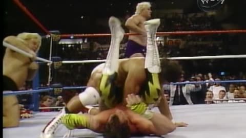 Brutus beefcake in yellow lightning tights/pants gets his hair cut