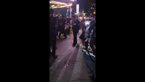 About 30 people were hurt early Saturday when a driver plowed into a crowd waiting