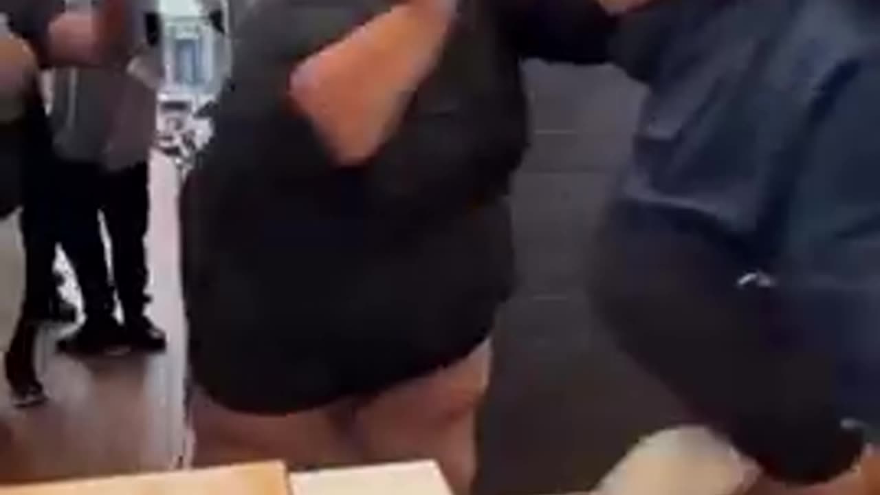 Crazy fat nigger at nigger infested fast food dump