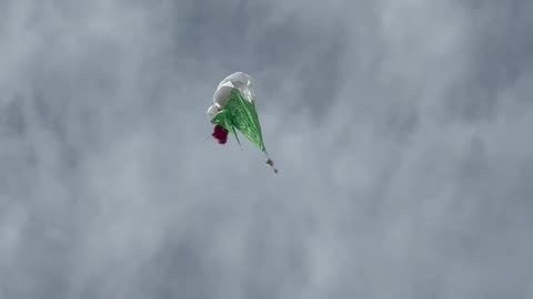 Skydiver Safely Cuts Away From World's Largest Italian Flag