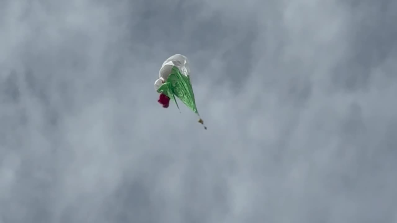 Skydiver Safely Cuts Away From World's Largest Italian Flag