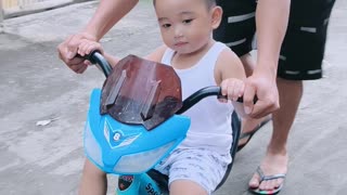 Isaiah riding bike