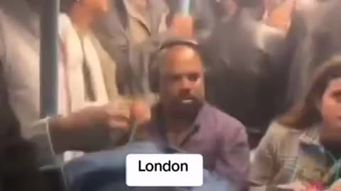 THEY ALL SCARED SHITLESS DERANGED NIGGER RAT ON THE LONDON TUBE UNDERGROUND THREATENS TO STAB