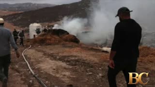 Israelis set fire to Palestinian warehouse and land as West Bank attacks surge