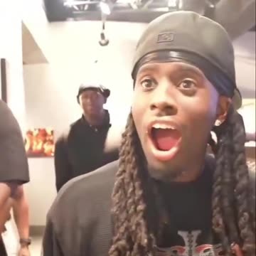 Kai Cenat watches as Duke Dennis takes a mans date