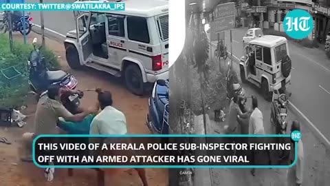 Breaking: Kerala cop fights man holding a giant machete; Video goes viral, netiz