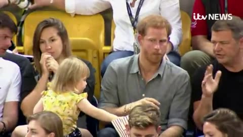 PRINCE HARRY POPCORN SWIPED BY TODDLER