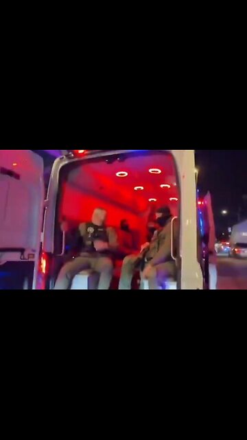 Maduro being paraded through the streets of new york in a van with all the doors open