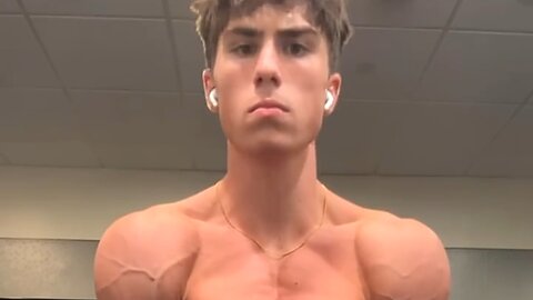 Young muscular man flexing