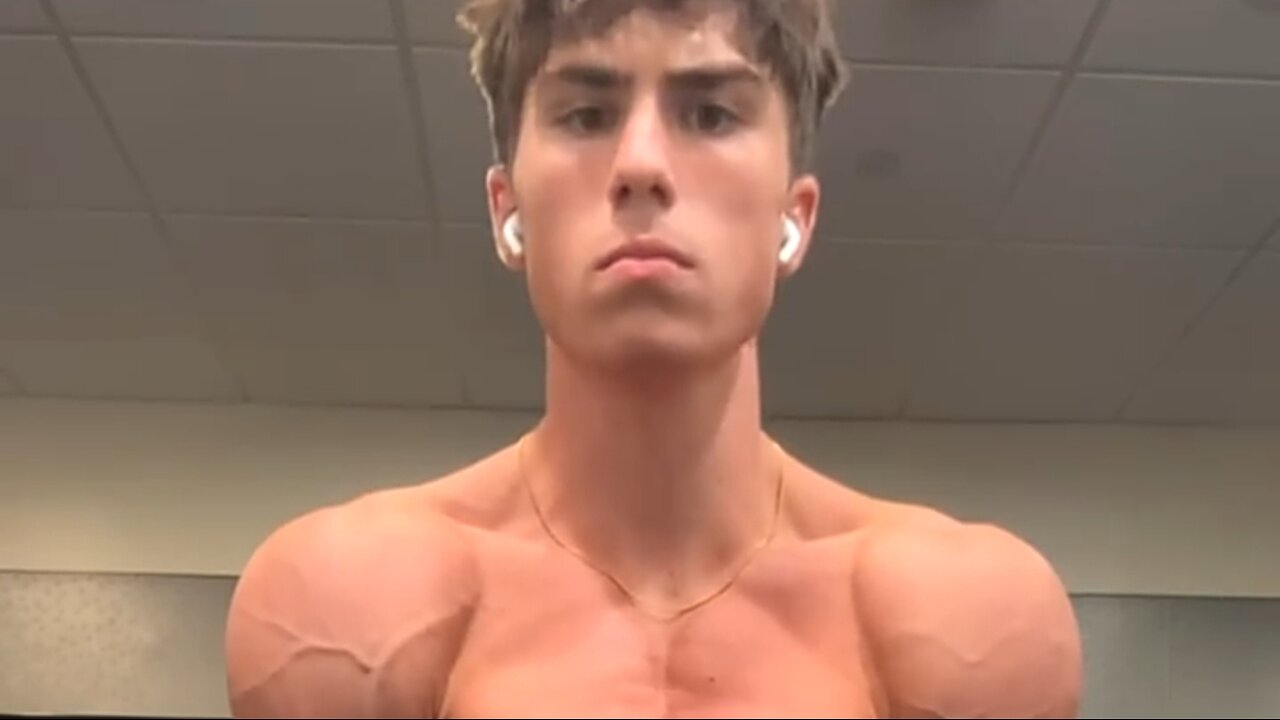 Young muscular man flexing