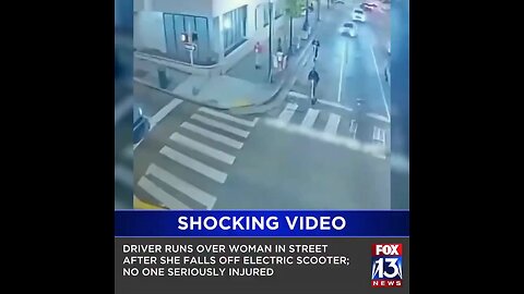 Shocking moment a woman falls off an electric scooter in the middle of the street… and the driver