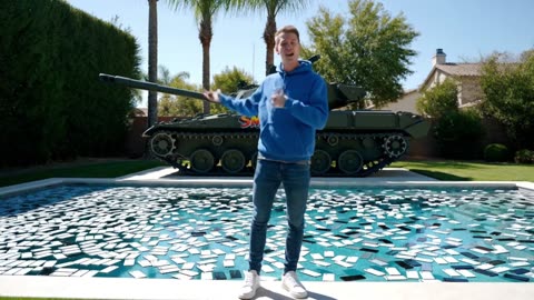 SmashDaddy | I Filled a Pool With iPhones and Drove a Tank Over Them
