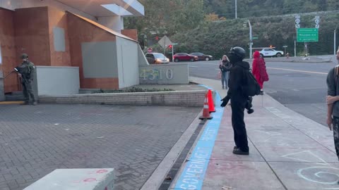 ICE Building, Portland, OR. A young woman in bloc spent several minutes screaming