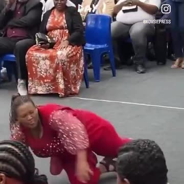 Negro rolls on the ground like a demonic possession at graduation