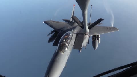 The 340th Expeditionary Air Refueling Squadron refuel F-15 Strike Eagle.