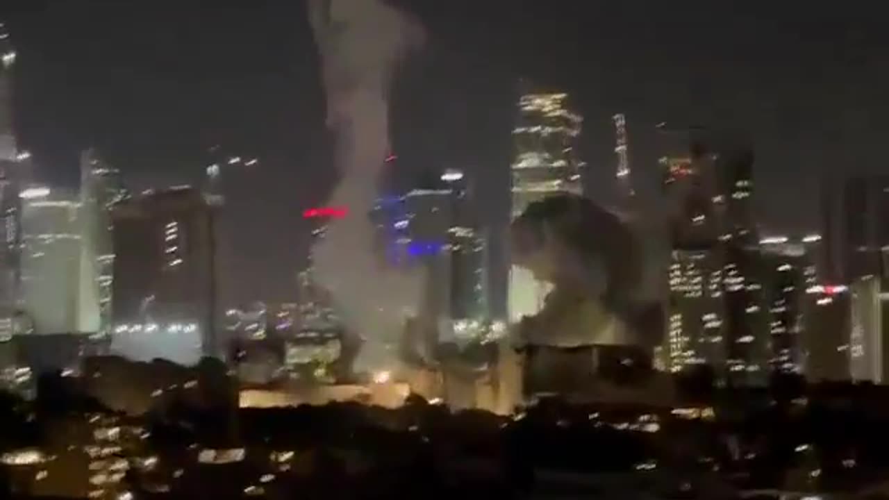 Another view shows the impact on Tel Aviv, Israel as Iran retaliates.