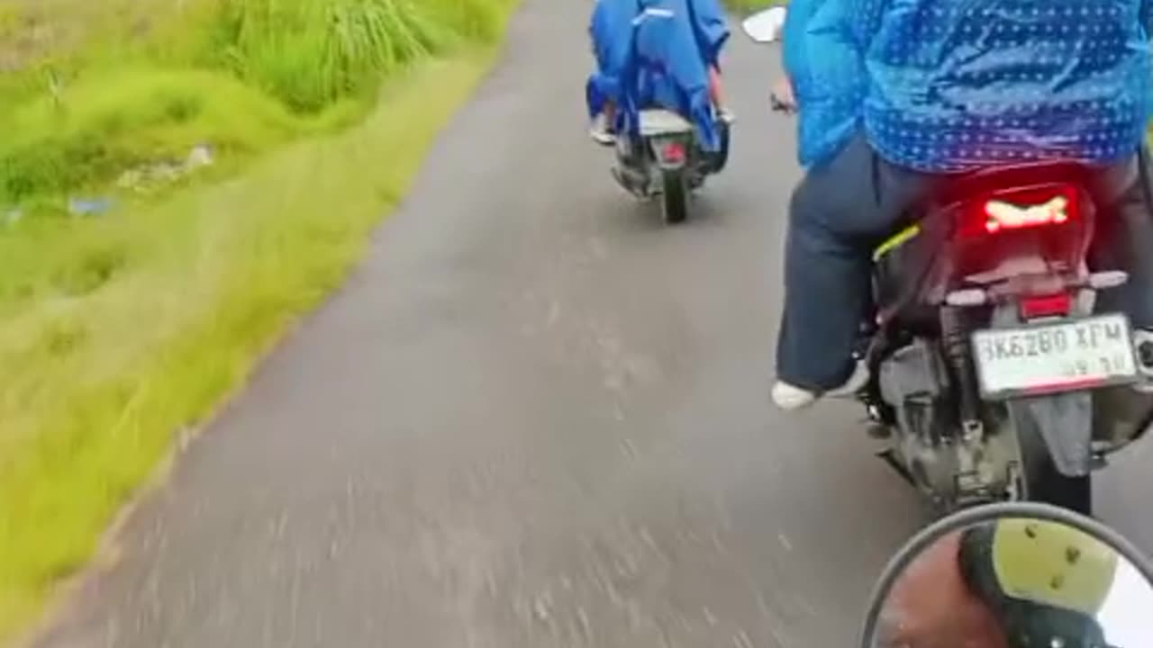 accompanied by a drizzle of rain