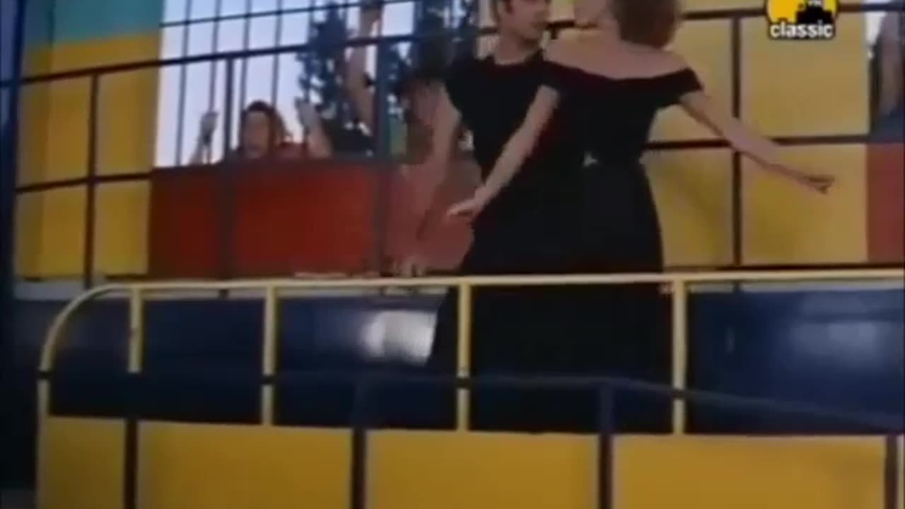 John Travolta and the Transvestite 😛[John Olivia Newton John]