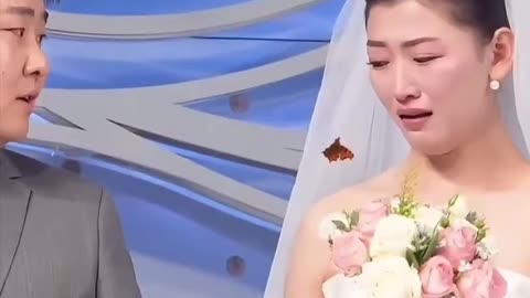 The bride's father died years ago. He had promised to come to her wedding,