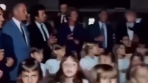 Trump at a jewish auction for young White children with his boy jeff