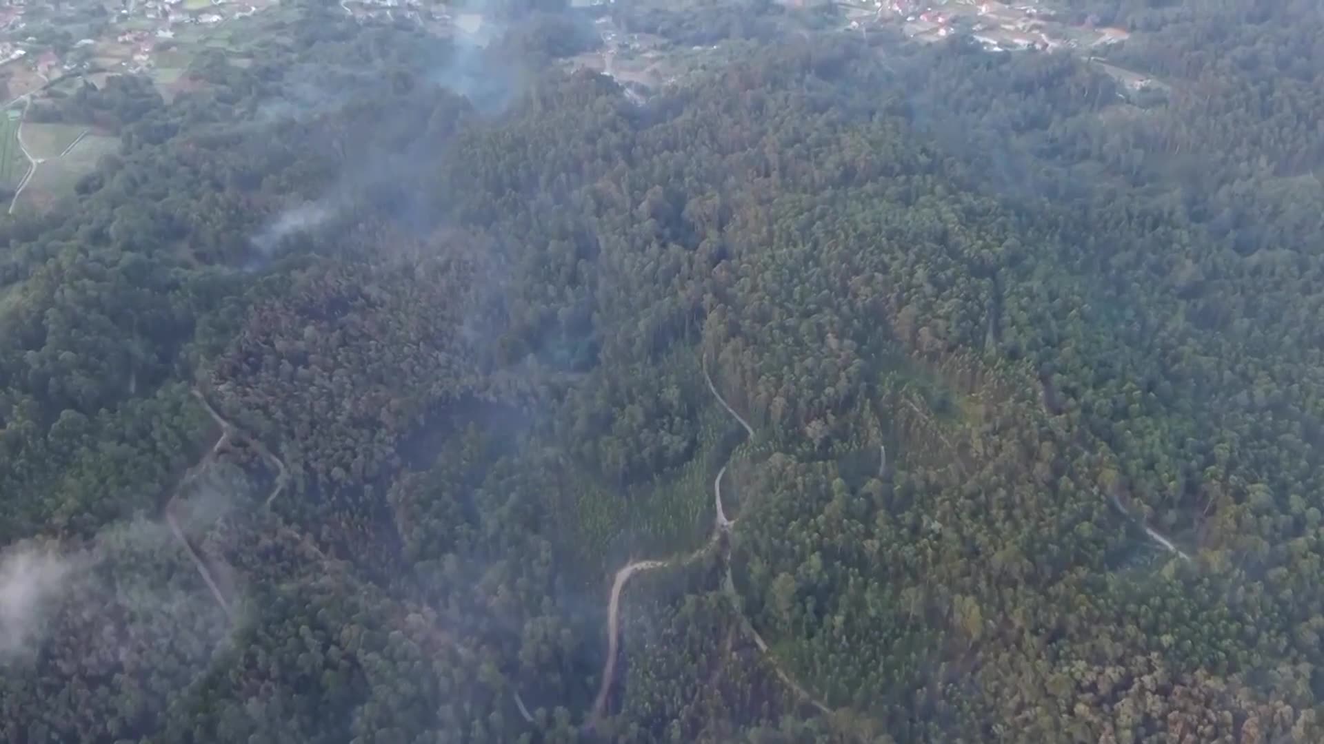 Weather shift in Spain helps firefighters control raging fires