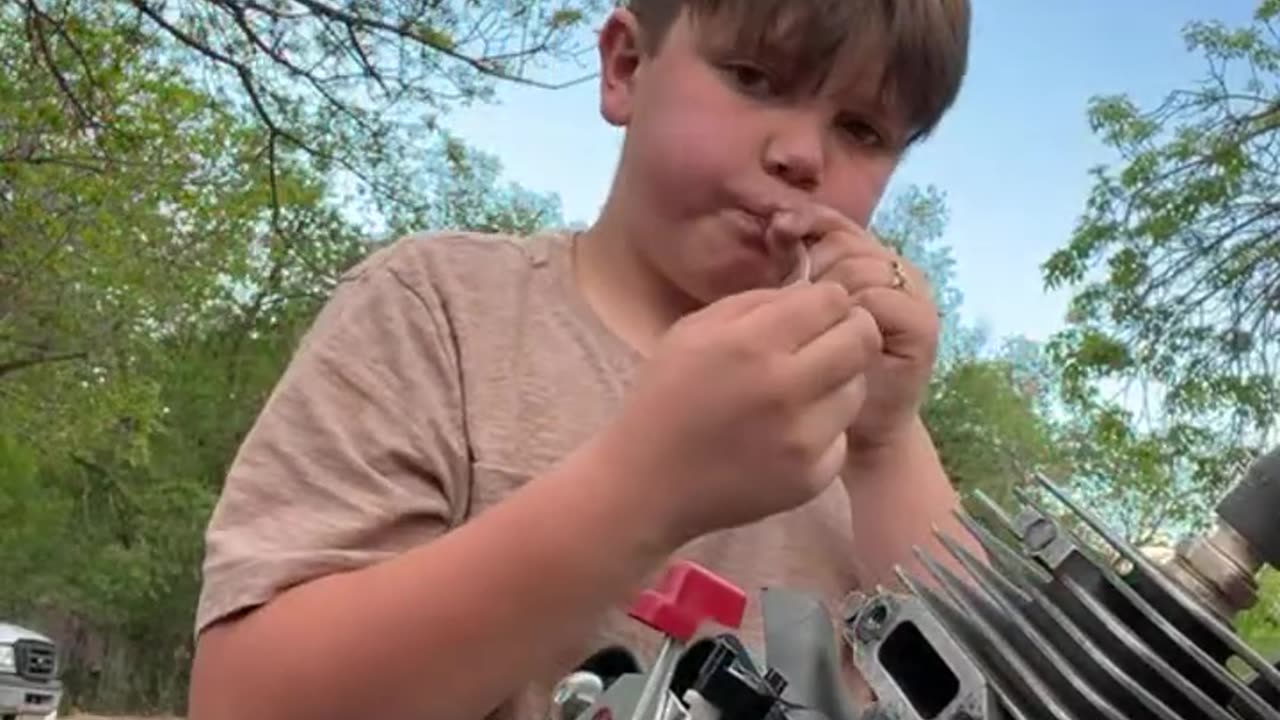 Koulie Kyle and Justus working on some smaller engines