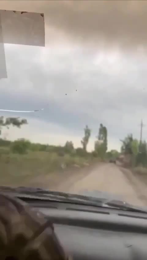 Ukrainian Vehicle Rocked by Russian Drone