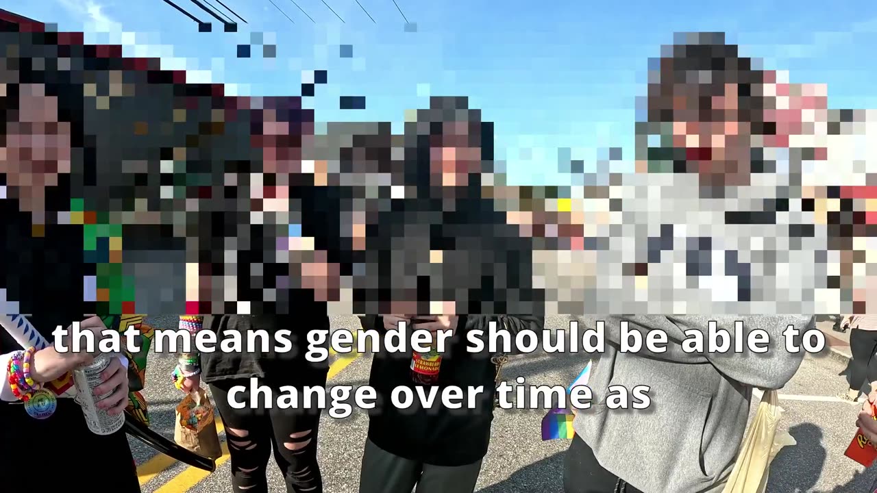 Teens discussed my "There's No Such Thing as a Trans Child" sign at a local festival.
