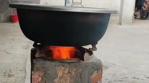 Cooking on a Homemade Brick Stove