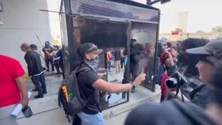 Officers Deploy Tear Gas and Storm Protestors at Federal Detention Facility in Downtown Los Angeles