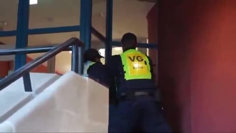 A woman has been arrested for flying a British flag at Epping council building.