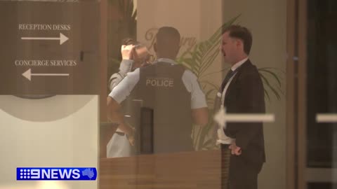 Hotel receptionist in custody after allegedly stabbing a colleague 9 News Australia