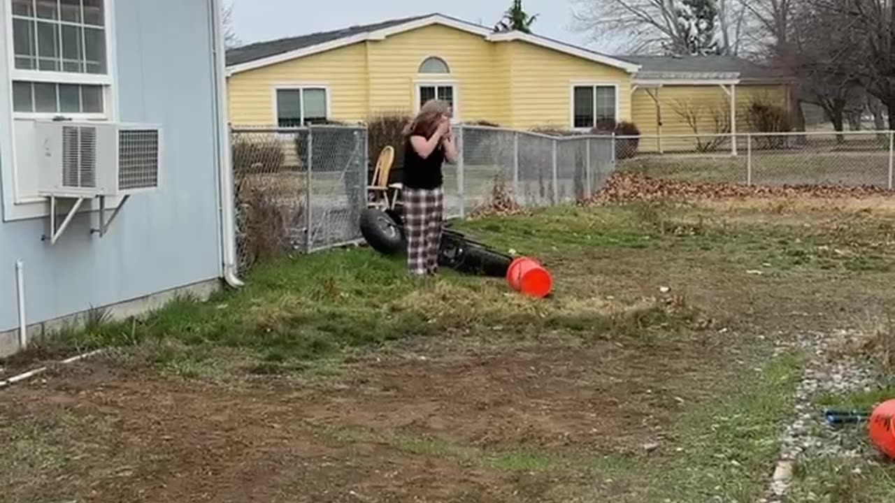 Girl Crashes Mini Bike Into Fence
