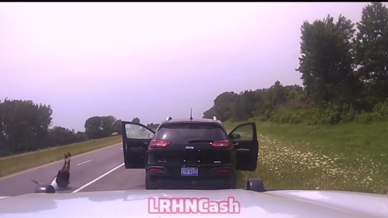 Man has kidnapped woman inside his vehicle during a traffic stop.