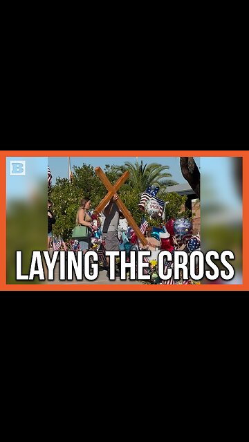 Man Seen Laying Giant Wooden Cross in Front of TPUSA Headquarters