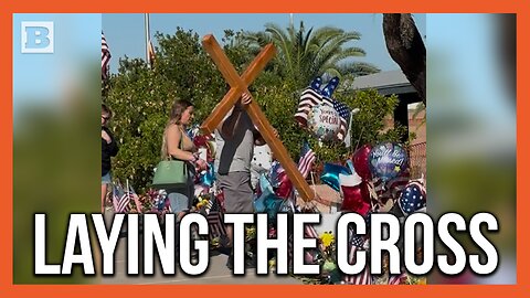 Man Seen Laying Giant Wooden Cross in Front of TPUSA Headquarters