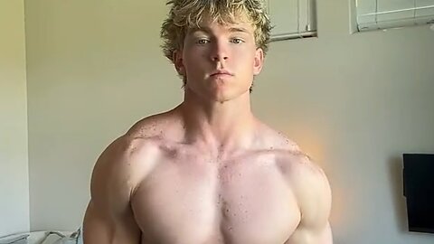 Handsome muscular man flexing